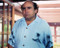 This is an image of 282759 Danny De Vito Photograph & Poster
