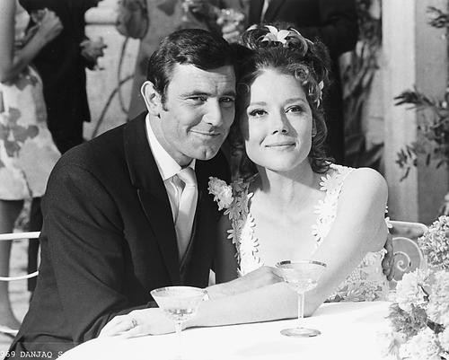 This is an image of 172271 George Lazenby and Diana Rigg Photograph & Poster