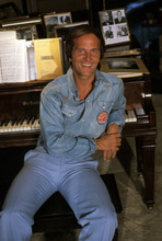 Pat Boone, smiling pose next to his piano 8x12 photo