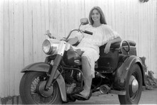 Emmylou Harris smiling pose in white lace top sitting on Harley bike 5x7 photo