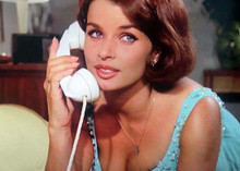 Senta Berger holding telephone wearing low cut blue dress 5x7 inch photo