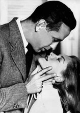 Humphrey Bogart about to kiss Lauren Bacall romantic pose 5x7 inch photo