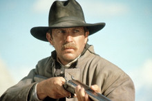 Wyatt Earp, Kevin Costner points rifle 4x6 photo