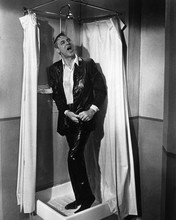 Charade Cary Grant takes shower fully clothed 12x18  Poster