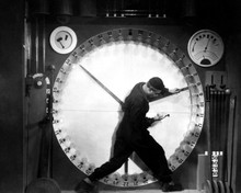 Metropolis human worker on clock 12x18  Poster