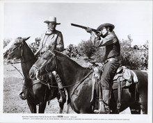 Chisum original 1970 8x10 photo John Wayne looks on Geoffrey Duel fires rifle