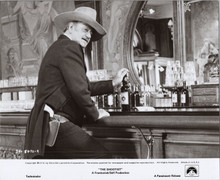 The Shootist original 1976 8x10 photograph John Wayne classic at bar with gun