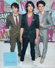 The Jonas Brothers 8x10 press photo posing together at Disney Camp Rock event