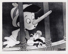 Pinocchio original 1980's Disney 8x10 photo Pinocchio with growing nose in jail