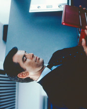 Goldeneye 8x10 photo Pierce Brosnan as Bond looks at his laptop