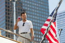 The Wolf Of Wall Street Leonardo Di Caprio on boat toasts American flag 8x10