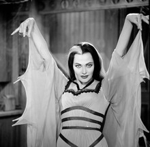 The Munsters Lily waist high holding up hands like vampire 8x10 photo