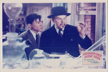 Murder Over New York 8x10 photo Sidney Toler as Charlie Chan looks at diamond