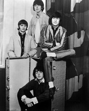 THE BEATLES THE FAB FOUR SITTING AROUND LUGGAGE TRUNK 8X10 PHOTO