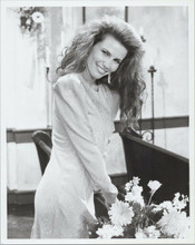 Tawny Kitaen with big smile poses by flowers in church 8x10 photo