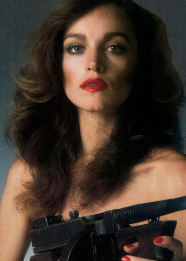 Pamela Sue Martin holds machine gun across naked chest Lady in Red 5x7