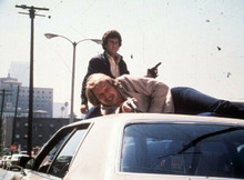 Starsky and Hutch Soul & Glaser atop car holding guns 5x7 inch photo