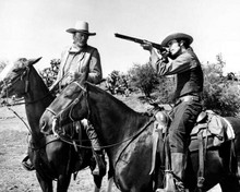 Chisum John Wayne on horse Geoffrey Deuel takes aim with rifle 8x10 photo