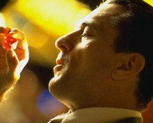 Casino movie Robert De Niro holds up red dice in profile 8x10 photo