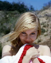 Carol Lynley smiles looking shy covering chest with towel on beach 8x10 photo