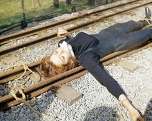Diana Rigg bound and gagged and tied to train tracks The Avengers Tv 8x10 photo