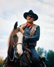 John Wayne classic Rooster Cogburn pose on horseback True Grit 8x10 photo