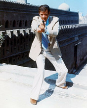 Roger Moore Man With The Golden Gun in classic 007 action pose pointing gun 8x10