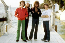 The Bee Gees classic of four Gibb brothers full length pose together 8x10 photo