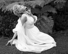 Stella Stevens 1960's glamour pose in white dress posing on lawn 8x10 inch photo