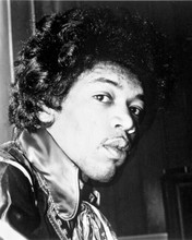 Jimi Hendrix in silk shirt & scarf looks to side 8x10 inch photo