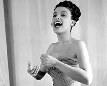 Lena Horne in off-shoulder dress singing 8x10 inch photo