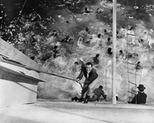 John Wayne climbs up side of capsized ship 1964 Circus World 8x10 inch photo