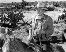 John Wayne on horseback as Will Anderson leading The Cowboys cattle drive 8x10