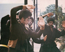 Jim Kelly looking cool does his karate moves Black belt Jones 8x10 inch photo