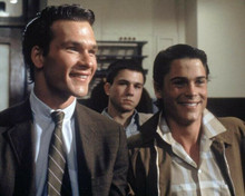 The Outsiders Patrick Swayze Rob Lowe smiling pose C.Thomas Howell 8x10 photo