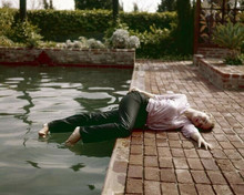 Tuesday Weld ermerges wet fully clothed from her pool lies on deck 8x10 photo