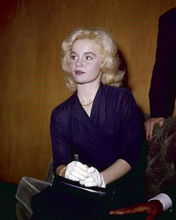 Tuesday Weld in white gloves holding handbag at Hollywood event 8x10 photo