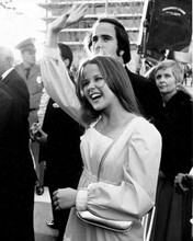 Linda Blair waves to fans during red carpet 1974 Academy Awards 8x10 inch photo