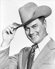 Larry Hagman tips his hat in J.R. Ewing enigmatic style Dallas 8x10 inch photo