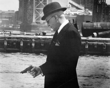 Telly Savalas in hat holding gun by Hudson River as Theo Kojak 8x10 inch photo