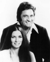 Johnny Cash poses for a portrait with june Carter Cash 1970's 8x10 inch photo