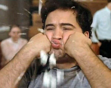 John Belushi in zit scene spits out food from Animal House 8x10 inch photo