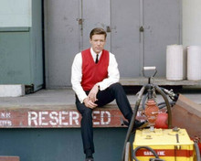 Richard Chamberlain between takes on Dr Kildare seated in red sweater 8x10 photo