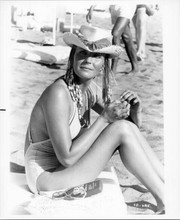 Bo Derek sits on beach wearing hat original 8x10 inch photo 10 1979