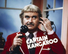 Captain Kangaroo Bob Keeshan in red jacket holding telephone 8x10 inch photo