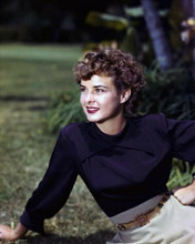 Ida Lupino 1940's era pose in blue blouse seated on grass 8x10 inch photo
