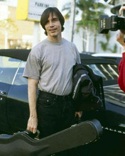 Jackson Browne 8x10 inch press photo carries his guitar at event 8x10 photo