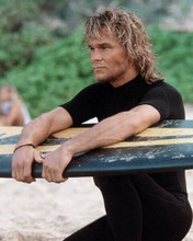 Patrick Swayze in wet suit holding his surf board from Point Break 8x10 photo