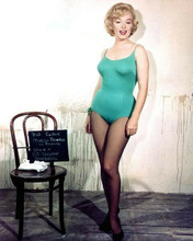 Marilyn Monroe wears green swimsuit and black stockings 1950's 8x10 inch photo