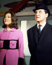 The Avengers Diana Rigg in purple coat with Patrick Macnee 8x10 inch photo